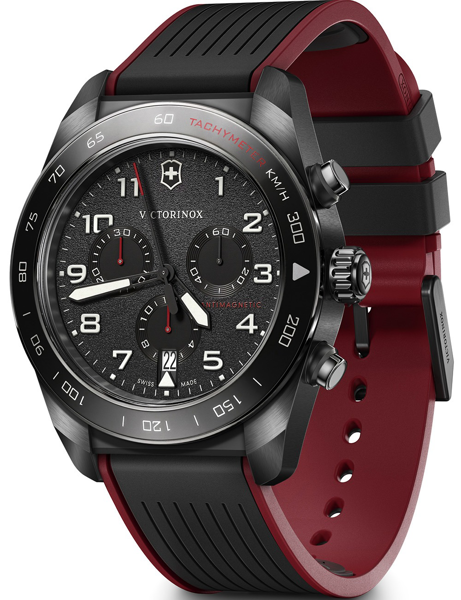 Victorinox Swiss Army watch with black dial, silver hands, tachymeter, and red-black textured strap.