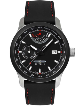 Black dial watch with day, date, and power reserve indicators; black strap with red stitching.