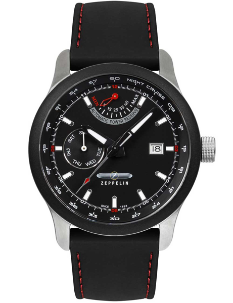 Black dial watch with day, date, and power reserve indicators; black strap with red stitching.