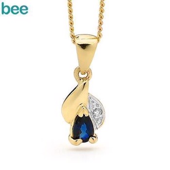 9 carat gold pendant with diamonds and sapphire